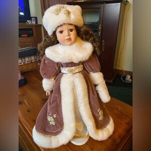 Charming Doll in brown, purple beautiful dress with white fur hat, puff for hand